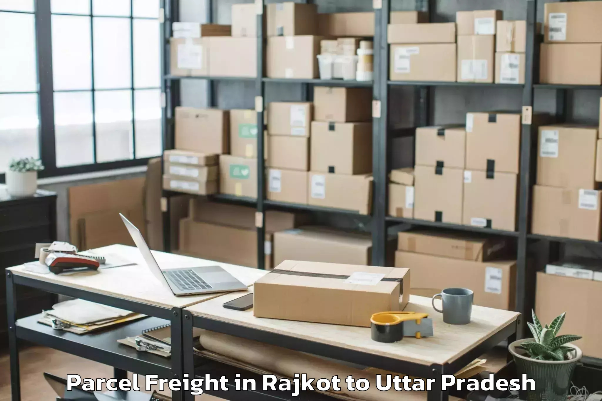 Reliable Rajkot to Manjhanpur Parcel Freight